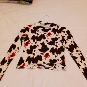 Cow print turtleneck
